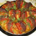 Meatballs with Potatoes and Tomatoes in the Oven