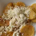 French Fries Cooked in Butter and with Feta Cheese on Top