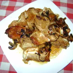 Pork Fillets with Onions and Mushrooms in the Oven