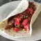 Burrito de berenjenas y tomate fresco
