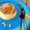 Cheesecake-dessert met pijnboompitten en karamel