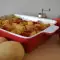 Печени картофи с домати и лук на фурна
