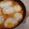 Яйца с брынзой на сковороде