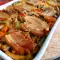 Panceta de cerdo con arroz y verduras al horno