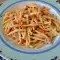Trofie pasta met geroosterde paprika, ham en gorgonzola