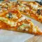 Thin Pizza with Mozzarella, Ricotta and Zucchini