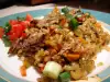Cordero al horno con calabacín, arroz y zanahoria