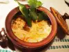 Clay Pots with Feta Cheese and Sausages