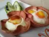 Колбасные корзинки с яйцом в духовке