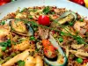 Paella de mariscos y quinoa