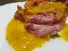 Confit de pato con salsa de naranja