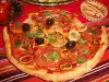 Vegan Pizza with Tomatoes, Olives and Basil