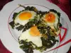 Eggs Sunny Side Up on a Bed of Dock and Spinach