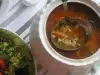 Fischsuppe mit Reis, Zwiebeln und Paprika