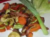 Свински уши със зеленчуци и вино на тиган